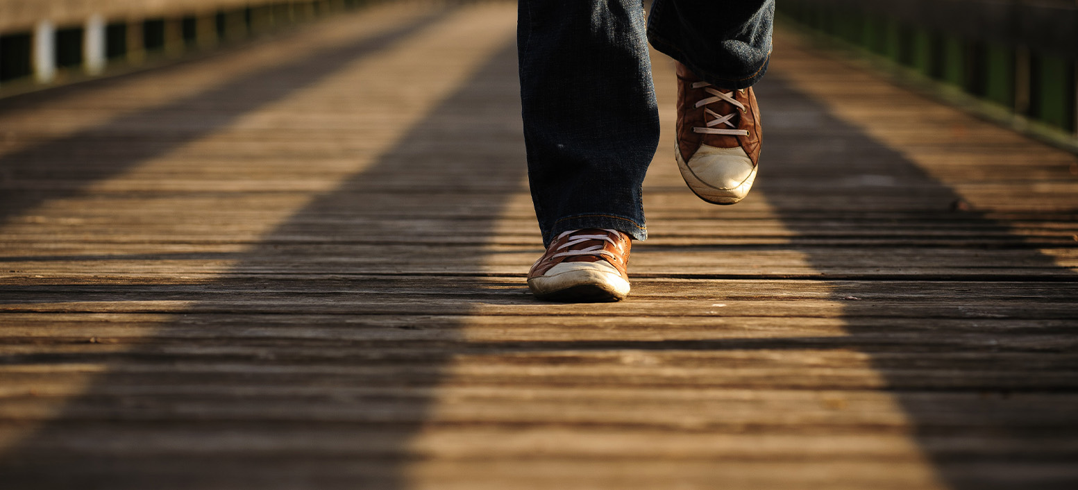 person jogging at risk of common causes of falls